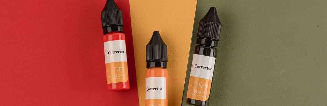 Modifier & Corrector Pigment bottles in red, yellow, and olive green