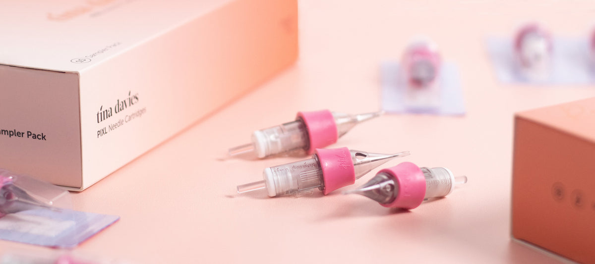 Tina Davies Needle Cartridge box with individual needle cartridges displayed outside.