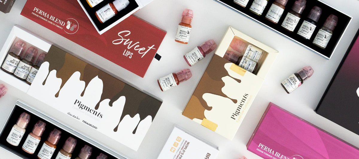 Top view of multiple PMU pigment sets and individual pigments showcasing a wide variety of colors and collections.
